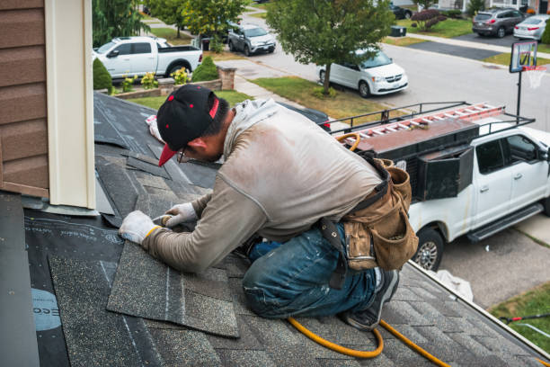 Professional Roofing technician working in New Freeport, PA